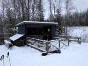 Wooden hut on the slope in Talma