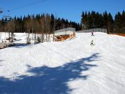 After the bridge, the slope at the Schneewittchenlift becomes a bit more challenging.