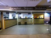 Well-maintained reception with ski pass ticket office