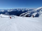 Start at the highest point in the ski area