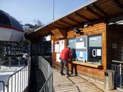Well-maintained ticket area with waste disposal facilities