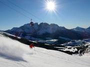 View from the König Laurin gondola lift over the Carezza ski area and Latemar