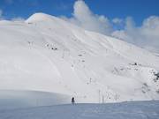 Slopes on the grass mountains above Le Corbier