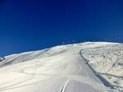 Slope grooming
