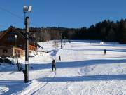 Button lift with easy slope