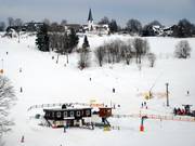 The church still stands in the middle of the ski resort