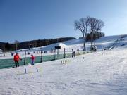 Practice slope of the ski school in the Deštné ski area