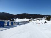Practice slope with Baby Coe conveyor belt at Passo Coe