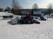The small snow groomer prepares the entire slope