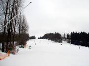 The wide final slope above the valley station