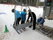 Assistance with boarding the double chairlift