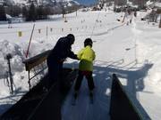 Assistance when boarding the platter lift
