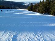 Slope grooming