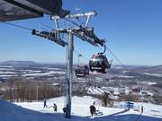 The modern combined installation takes skiers up to Mont Brome