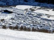 Holiday cabins and apartments right next to the Landsbytrekket drag lift and the snow park