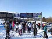 Digital displays at the entrance to the chairlift