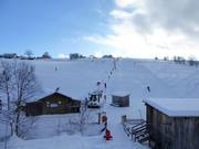 Clear ski slope with platter lift in the municipality of Hinterschmiding