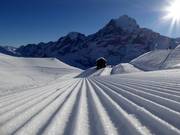 Perfectly groomed slope in the First ski area