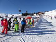 Practice area at the mountain station of the Loferer Alm Bahn II with covered conveyor belt