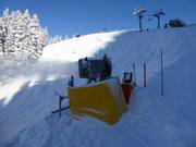 Snow cannon in operation at Almkopf