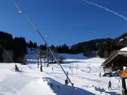 Energy-efficient snowmaking system