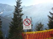 Barrier and warning notice for the protection of the mountain forest