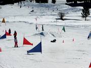 Small jumps at the snowboard practice lift
