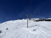 Powder slopes below the chairlift