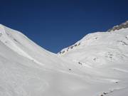 Countless steep slopes await powder skiers