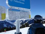 Signage with a small slope map (overall and detailed view)